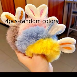- NEW hair ties with bunny ears. (4 @ 9.00 Each)